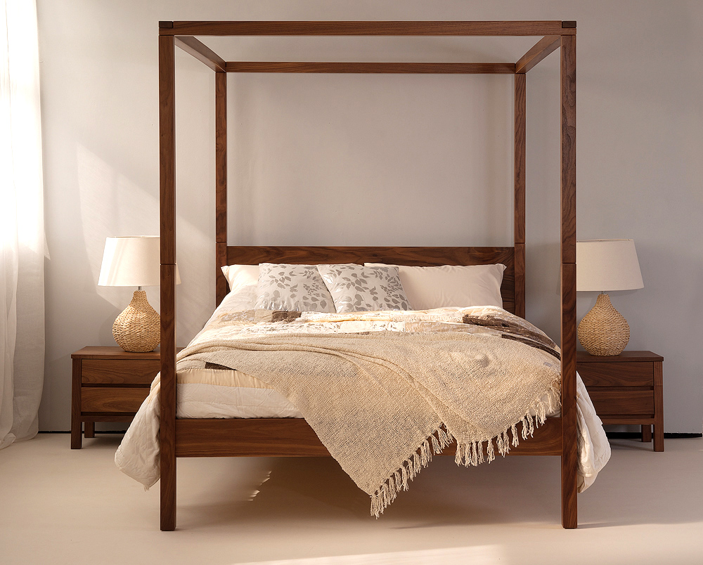 orchid a solid wood contemporary four poster bed shown in Walnut with Walnut Shaker Bedside drawers