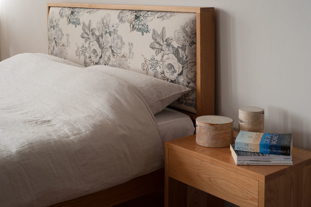 Shetland classic wooden bed with floral patterned headboard and oak bed frame