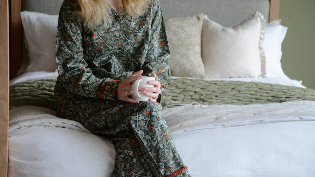 Botanical Berry PJs on model with mug