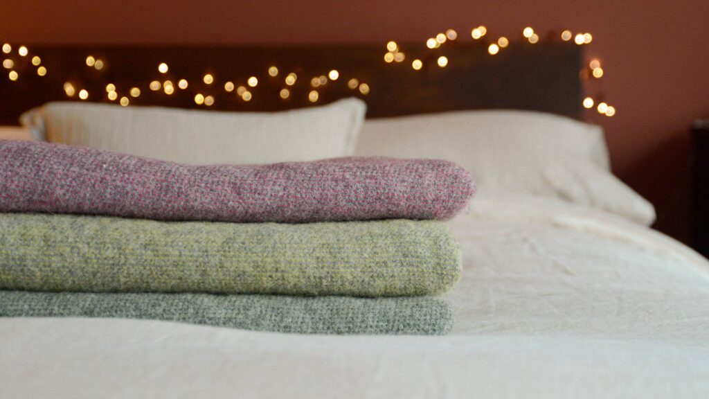 McNutt Wool Marl Throws T to B Blackberry Citrus Sage