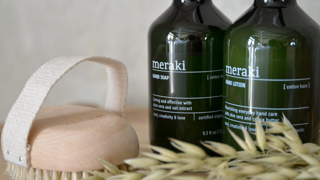 close up of meraki hand soap and lotion.
