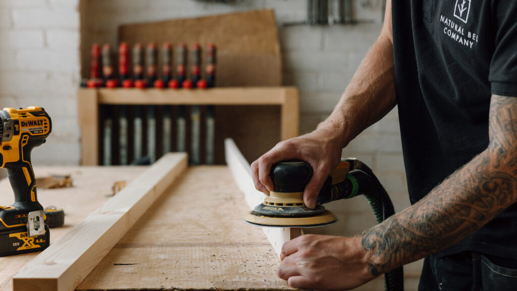 NBC workshop wood workers sanding