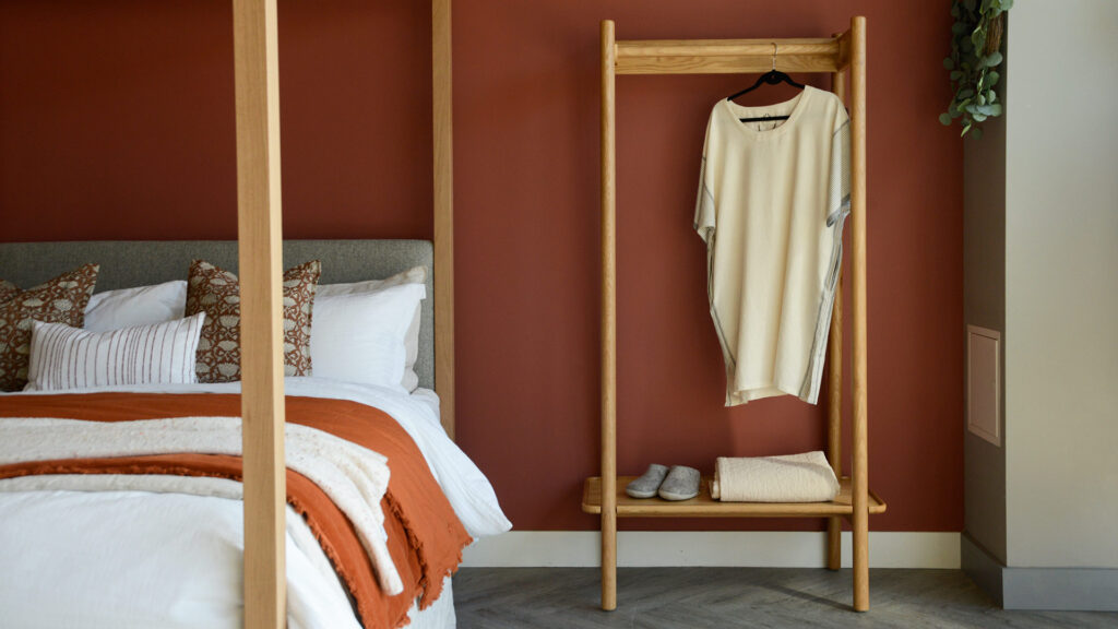 Oak Open Wardrobe Spindle next to Oak Highland Roomset