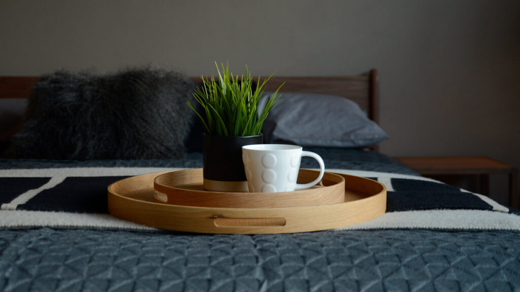 Wireworks Oak Trays both sizes stacked with plant and mug