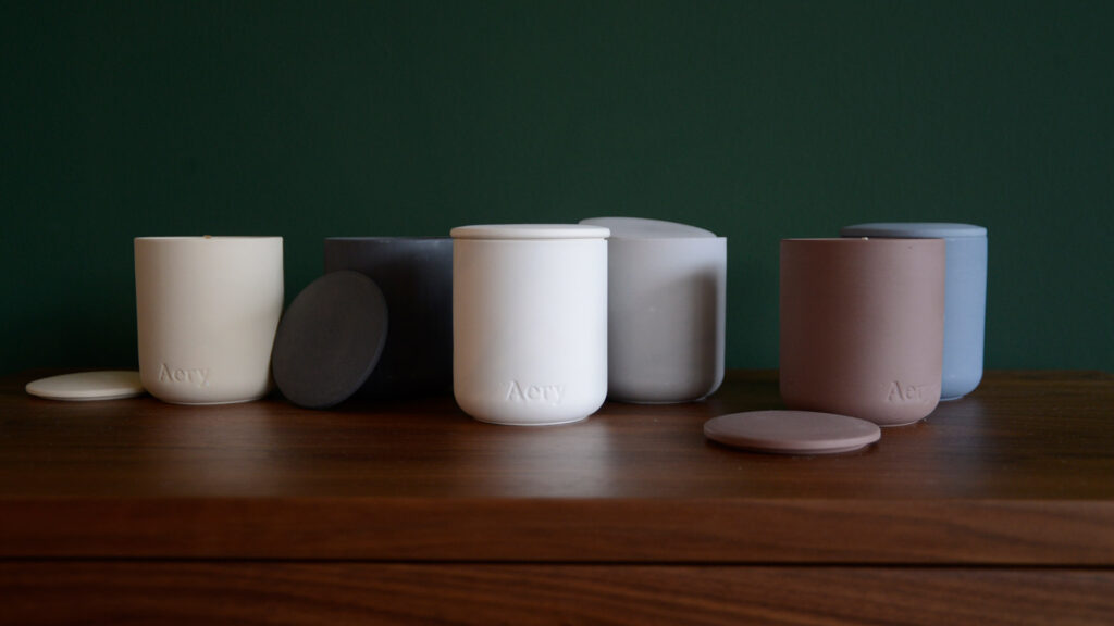 aery scented candles in colourful pots