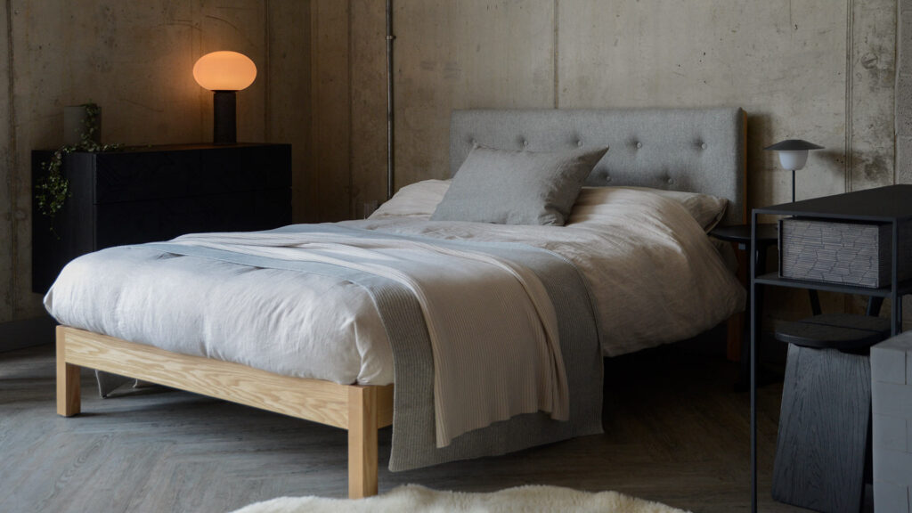 arran bed with ash base and pale grey parquet headbaord