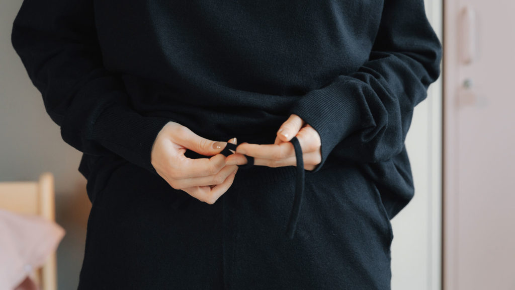 black knitted hoodie and joggers detail