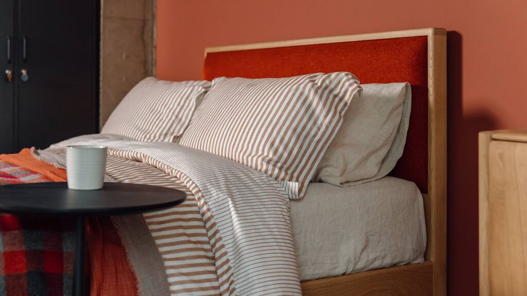 carlisle bed with upholstered headboard in parquet fabric