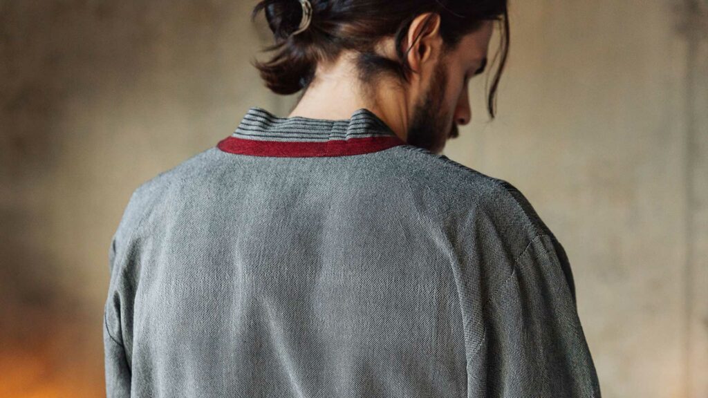 charcoal robe red neckline detail