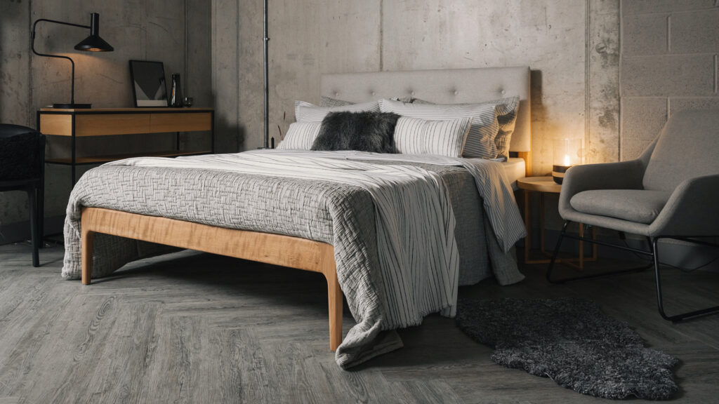 cherry bloomsbury bed with grey stripoed bedding