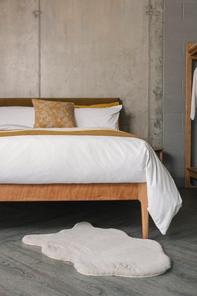 cheryy bloomsbury bed with white stonewashed cotton bedding portrait