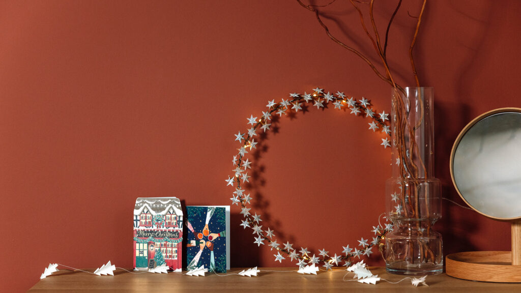 christmas star wreath with paper tree garland