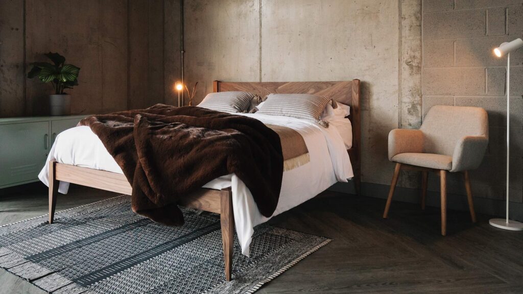 cosy luxury bedroom with a hand made solid walnut wood Dalston bed