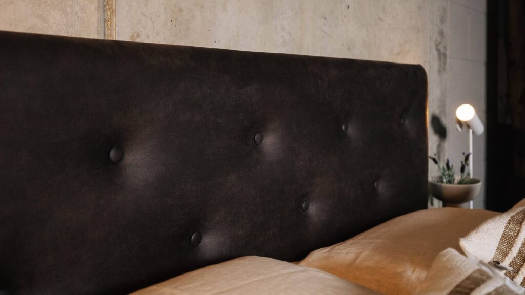 dark brown faux leather buttoned headboard