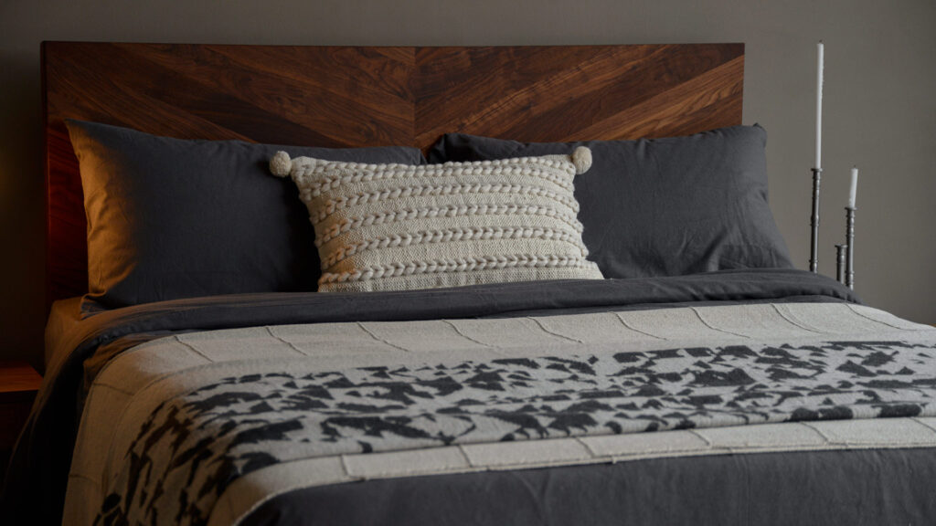soft brushed cotton bedding in slate grey shown on a walnut Hathersage bed