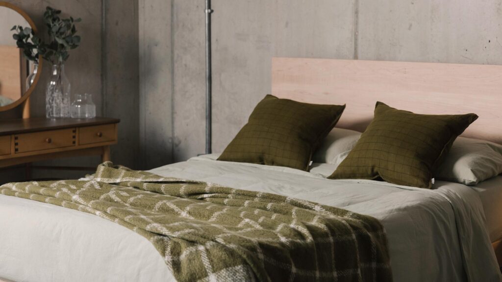 deep olive cushions and olive check throw