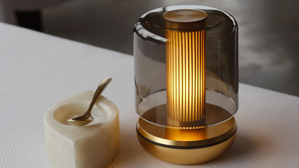 firefly lamp with gold base and smoked shade