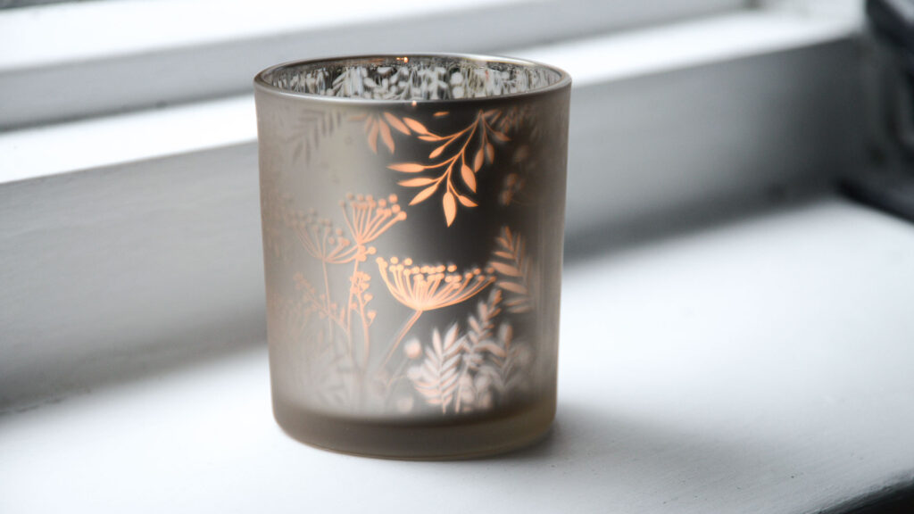 floral print silvered t light holder