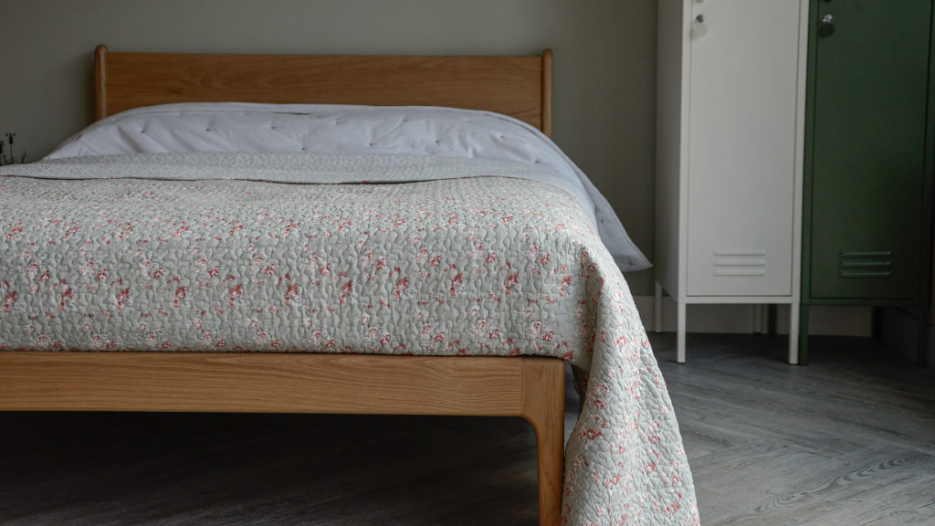 grey and red delicate floral print bedspread