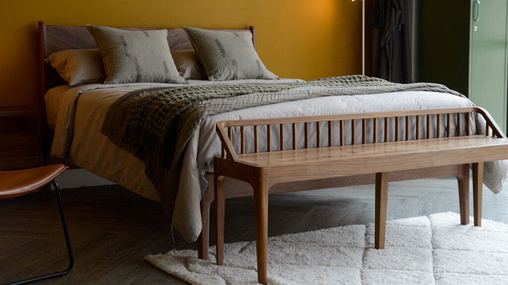 hoxton ed with olive accessories and reclaimed teak bench