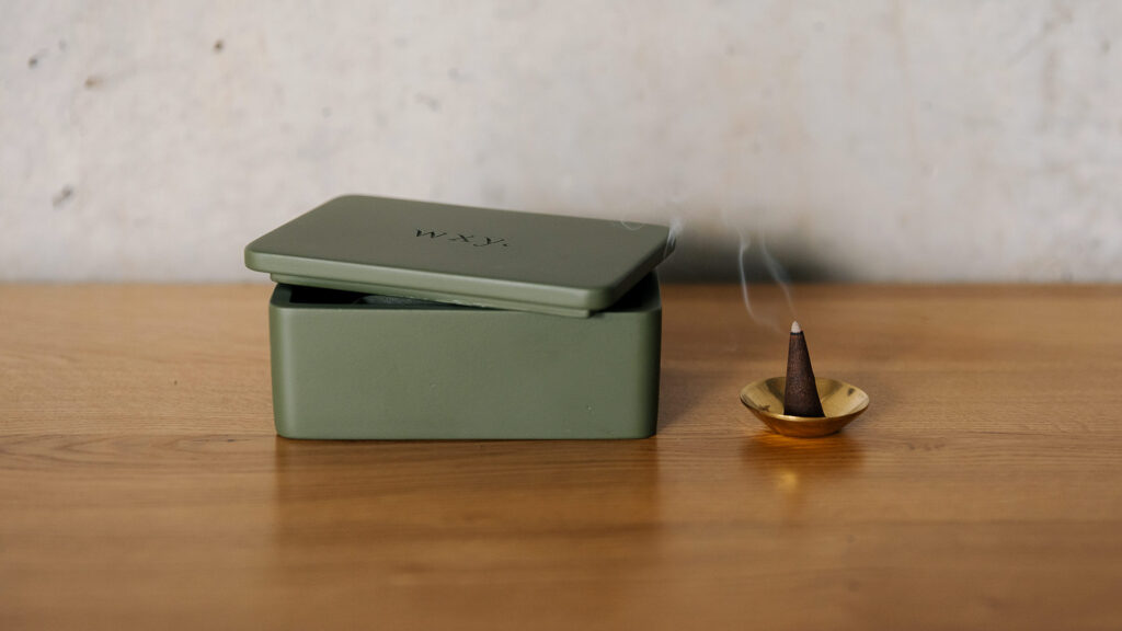 incense with holder and green storage box