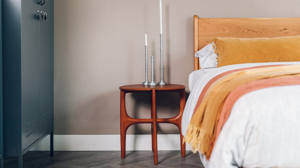 mahogany side table with oiled cherry bed