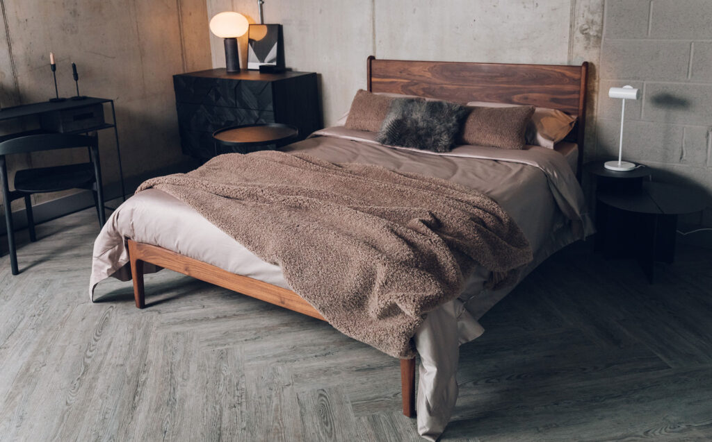 mink bedding with faux fur accessories on walnut oiled Camden bed