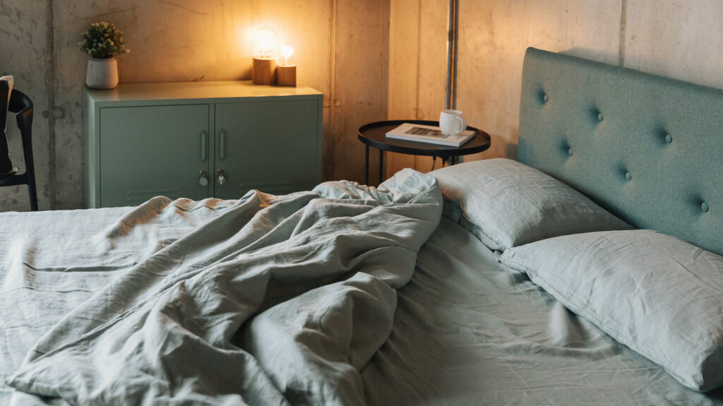mint green locker with green bedding on Arran bed