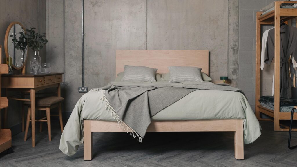 moss grey herringbone throw on the maple Bamford bed