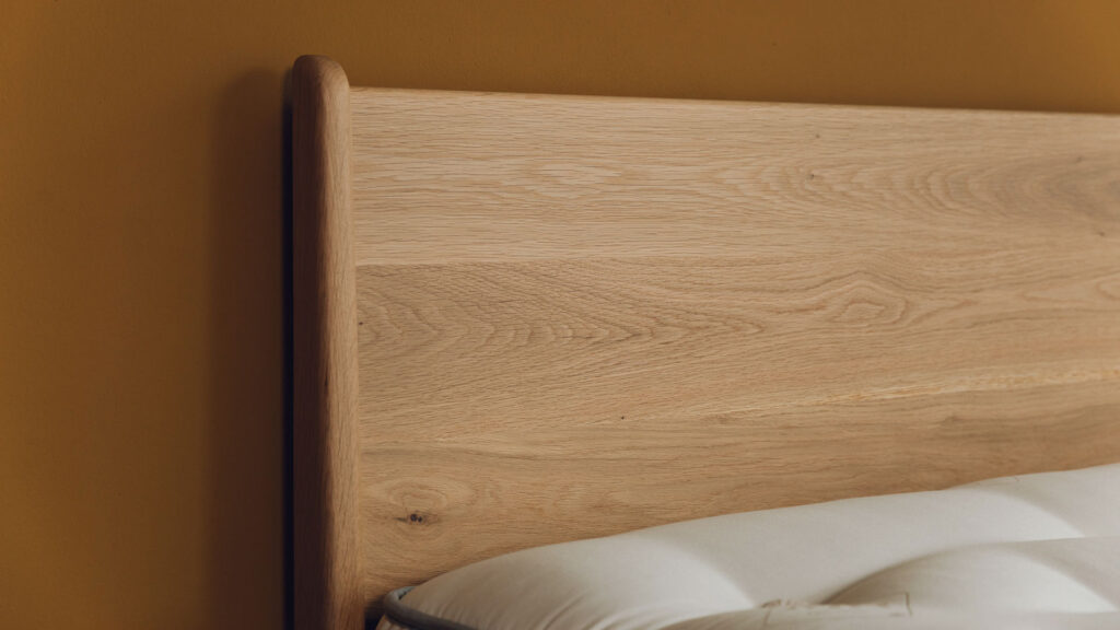 oak Camden bed headboard detail close up.