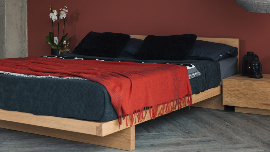 oak Kumo bed with red and black bedding