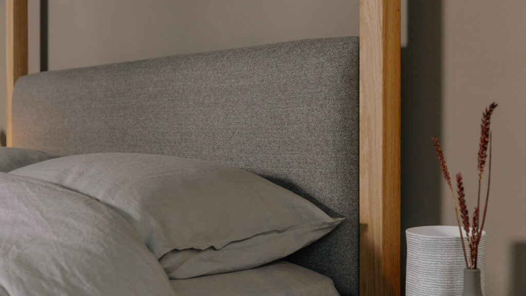 oak and mocha poole fabric headboard detail