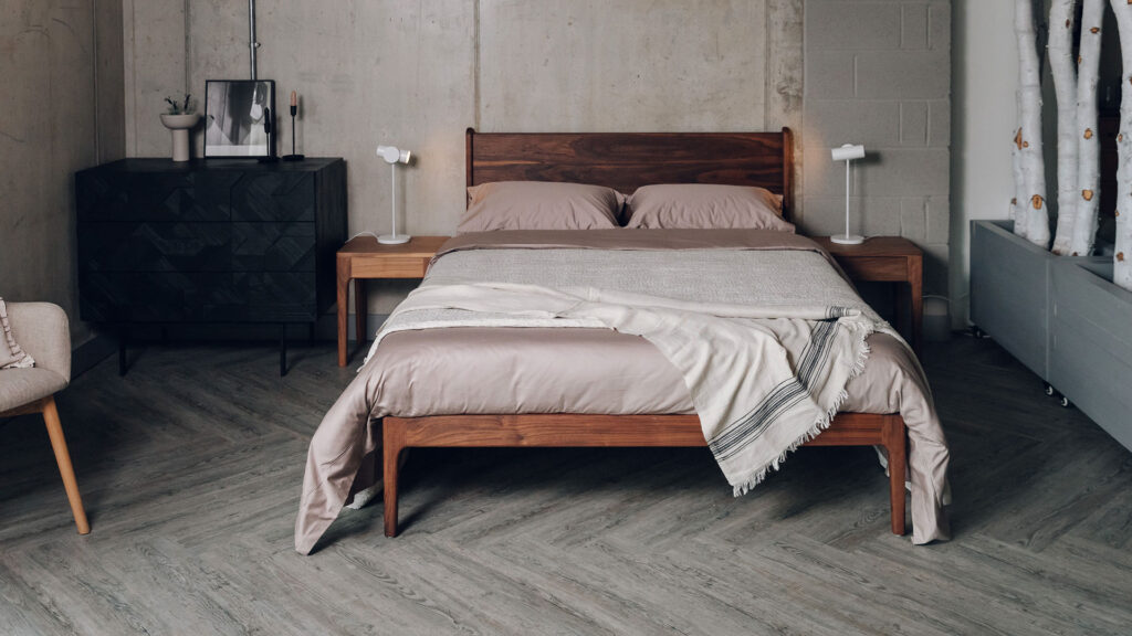 oiled walnut bed with camden tables and black chest