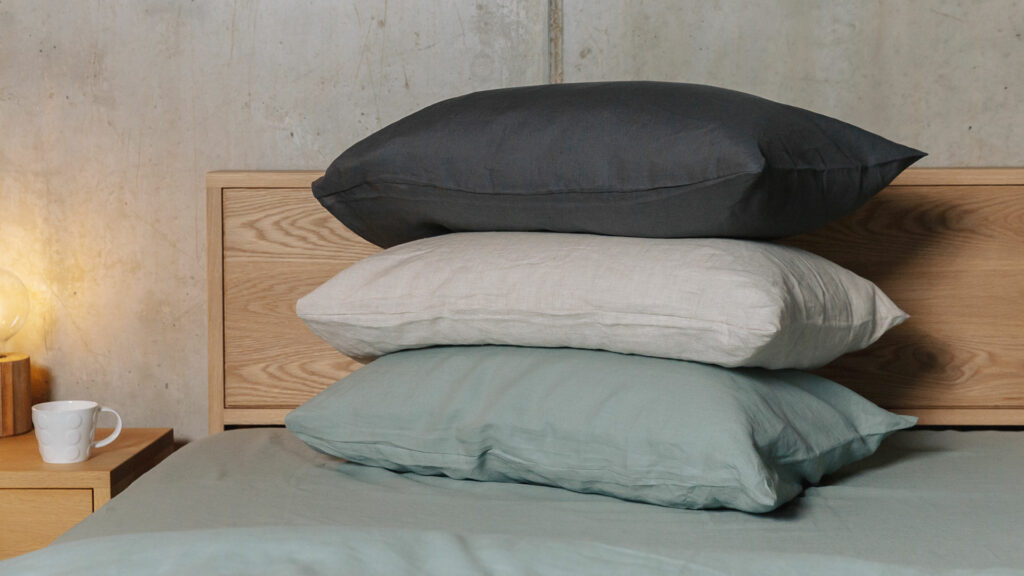 organic linen bedding in grey beige and green