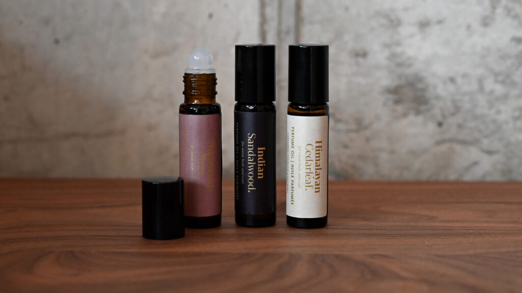 Perfumed oils without packaging. Lid off Moroccan Rose oil.