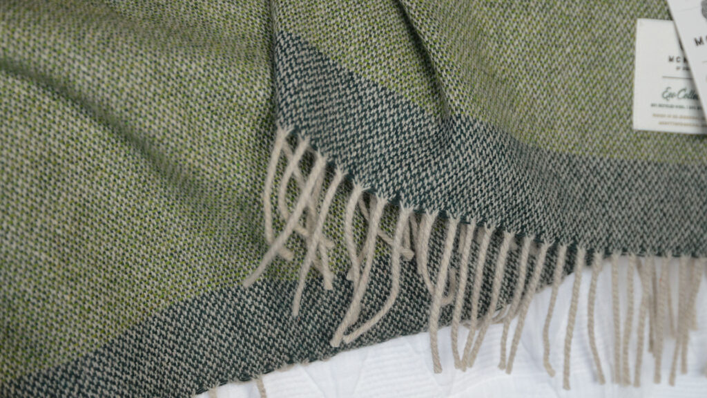 eco collection woven recycled wool throw in green and beige