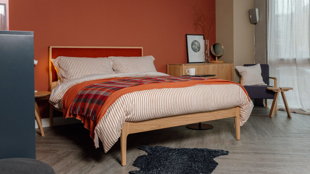 rust red bedroom set Carlisle solid oak bed with upholstered headboard