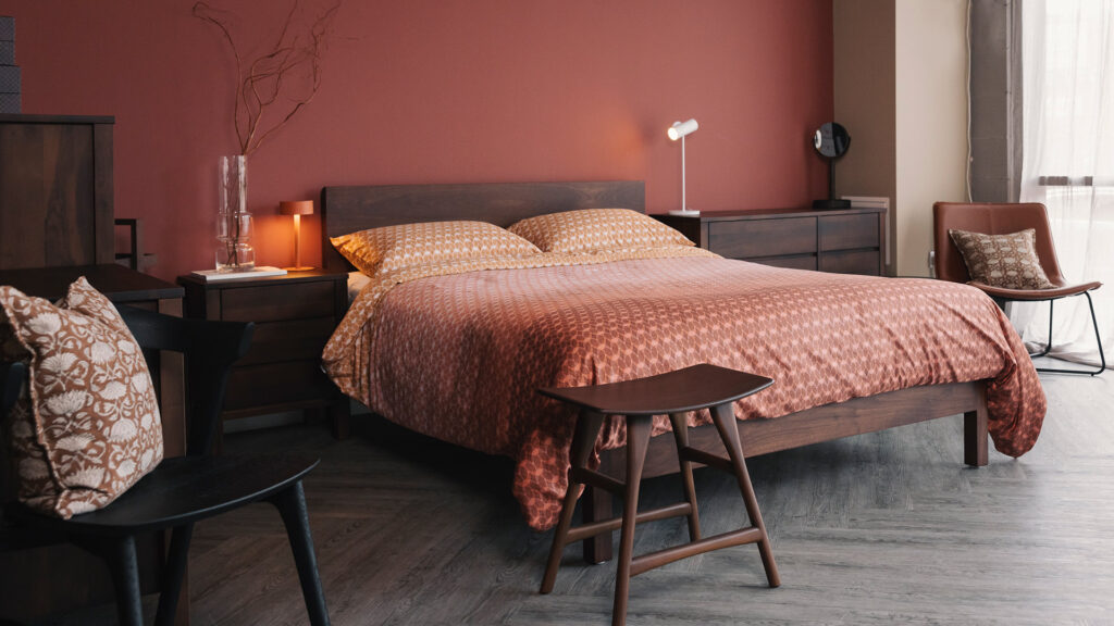 smoked finish walnut bedroom furniture with ombre tencel bedding in rust