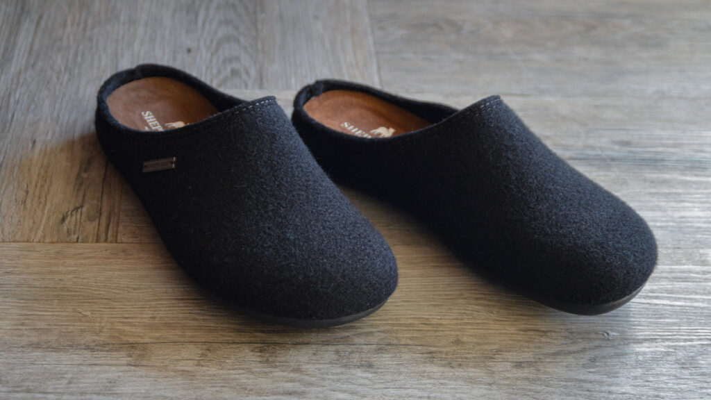 soft black open back slippers.
