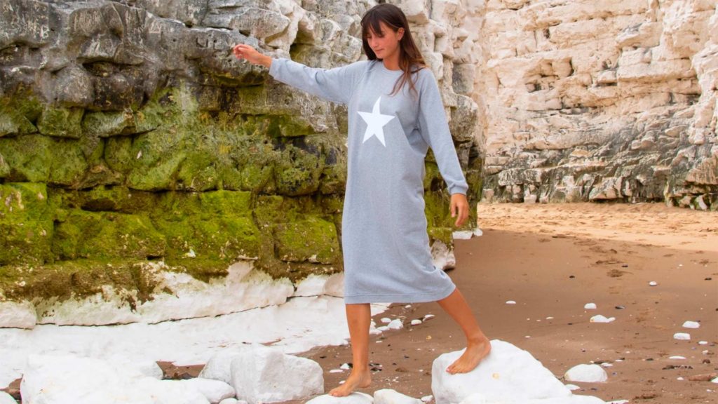 sweatshirt dress with star motif on model
