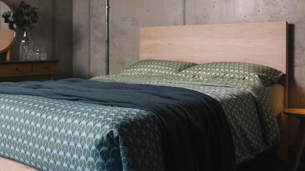 teal tencel duvet set with muslin bedspread in dusty blue