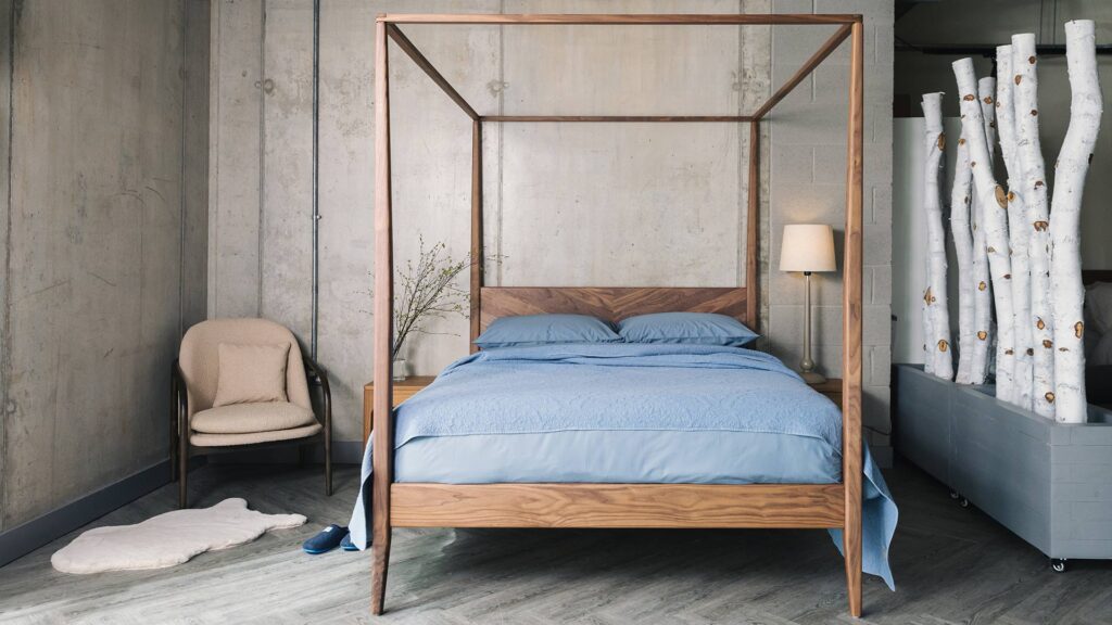walnut Harrow 4 poster bed with blue bedding