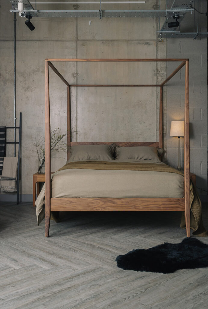 walnut Harrow 4 poster with olive bedding portrait