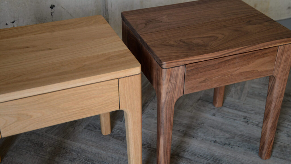 solid wood bedside tables with drawer shown in oak and walnut