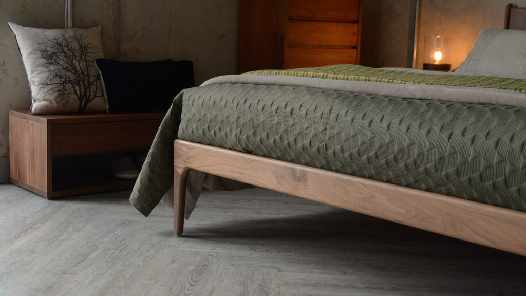 A closer view of the wooden Hoxton Bed leg made from Walnut wood.