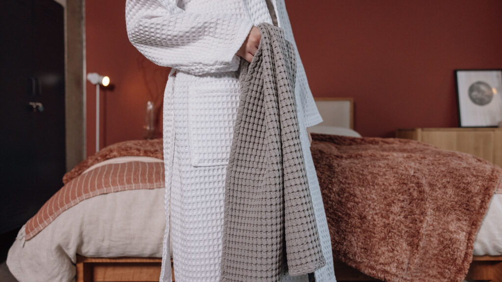 white waffle robe and grey waffle towel